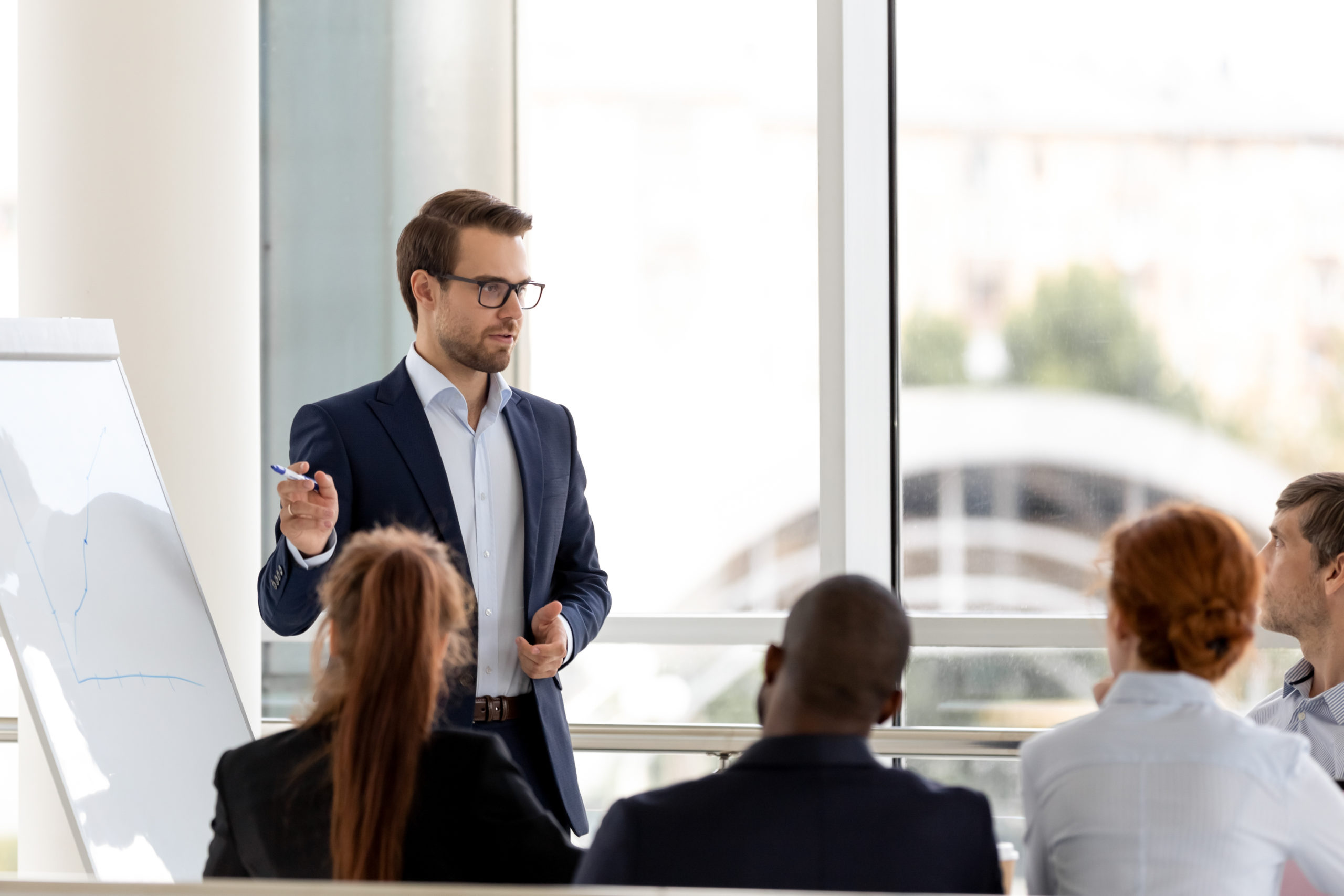 Boss presenting project to his team